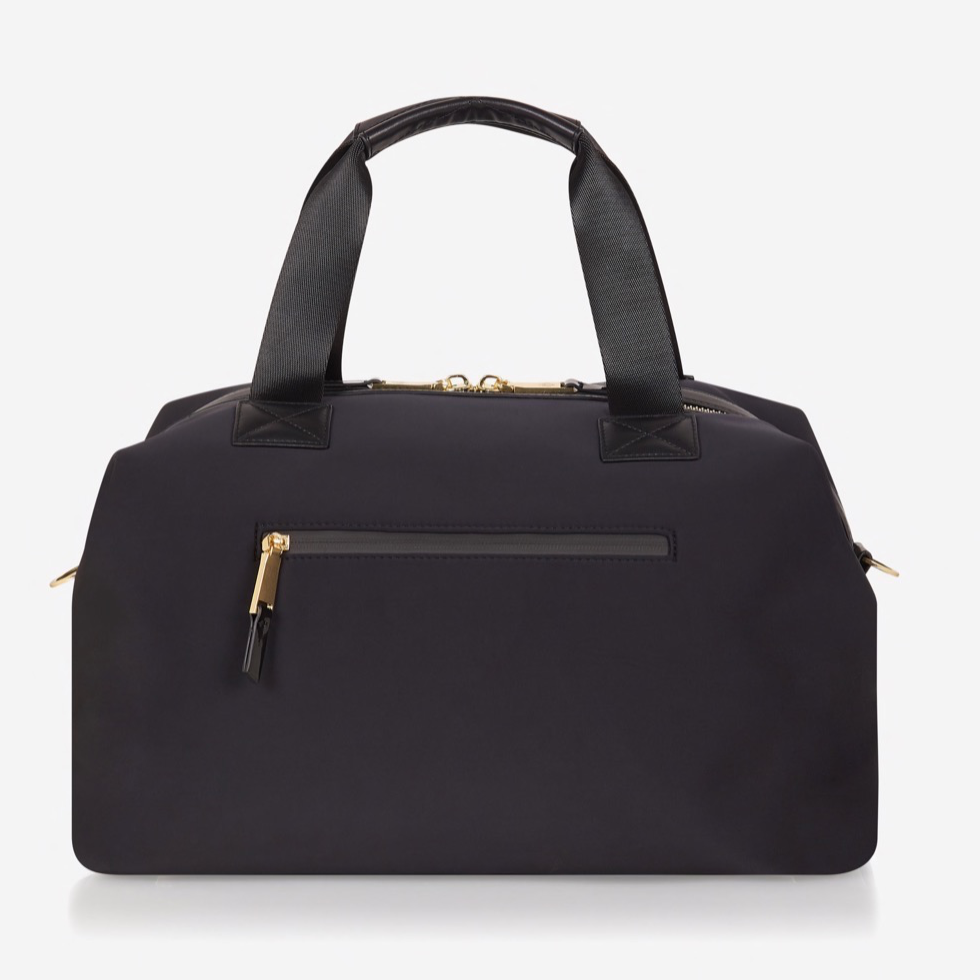 A sleek and compact every-day version of our best selling RAF WEEKENDER. Smaller but perfectly formed and includes all original internal functionality.   This hard-working holdall gets a sports-lux make-over in sleek Black scuba fabric, paired with lux gold hardware. The perfect size to fit all your essential items for a day out, it also doubles up as a stylish work bag, hand bag or overnight bag.