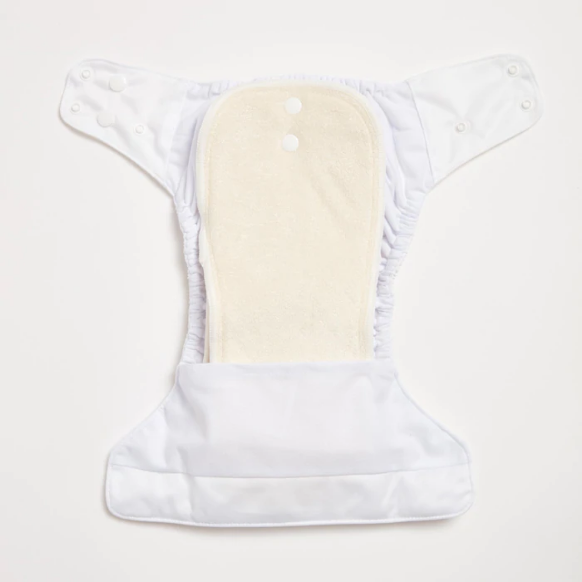 An open Snow White 2.0 Modern Cloth Nappy by EcoNaps on a white surface.