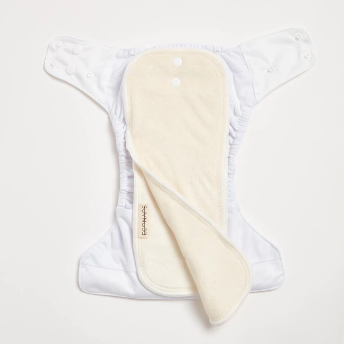 An open Snow White 2.0 Modern Cloth Nappy by EcoNaps on a white surface.