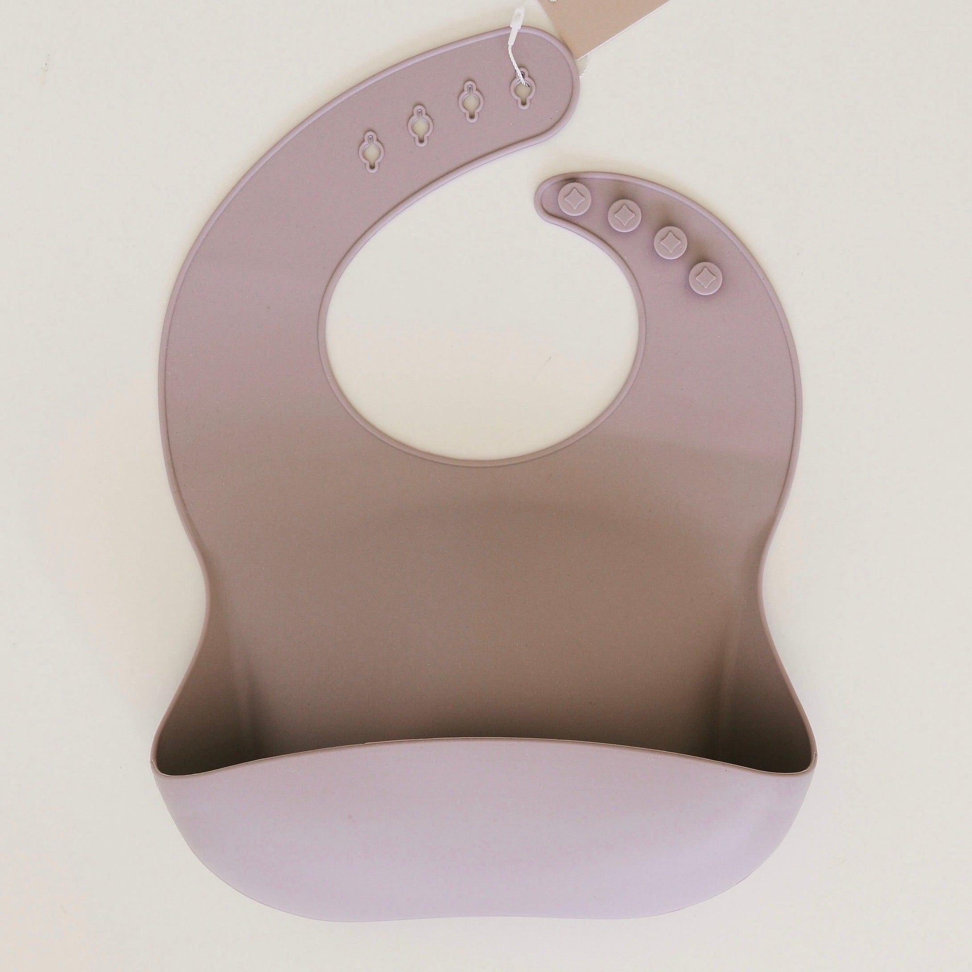 Rommer bibs are made from the softest silicone. They are both lightweight and durable. Rommer has updated the bib design to feature the reinforced button holes making them more resistant to tears.