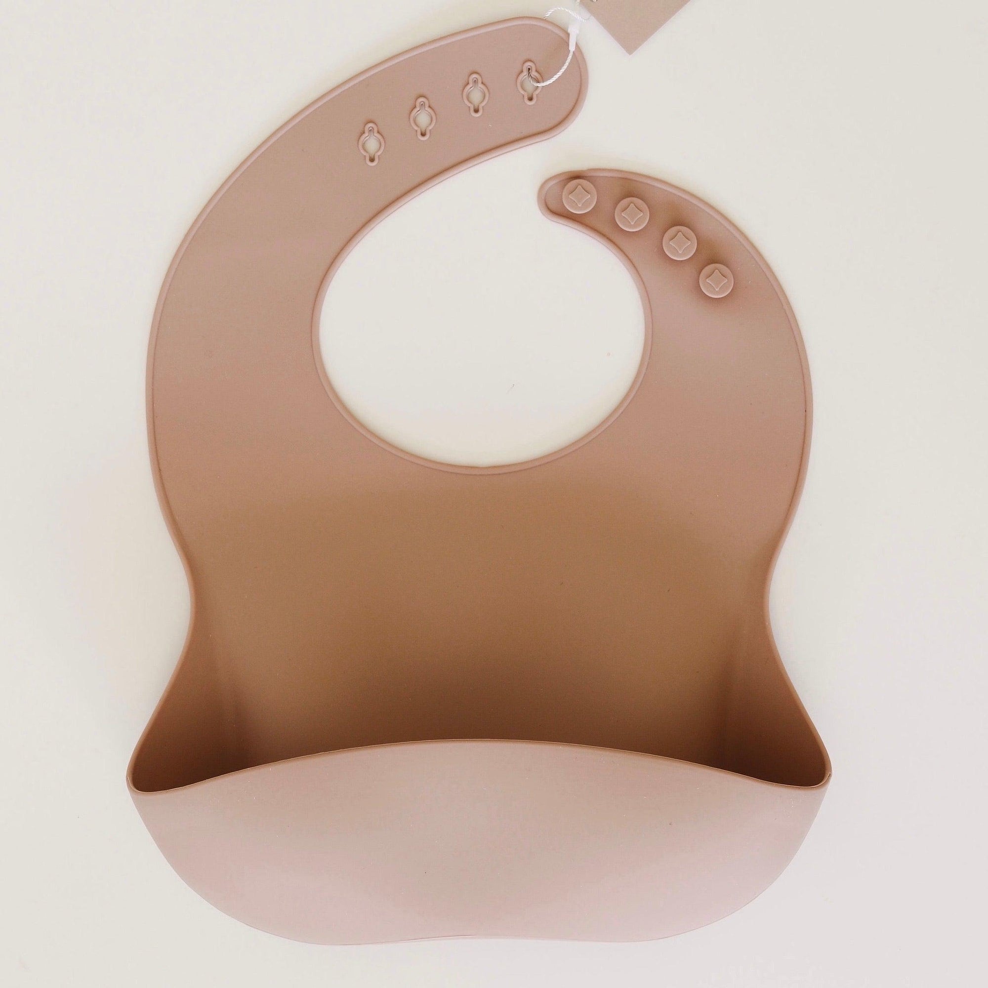 Rommer bibs are made from the softest silicone. They are both lightweight and durable. Rommer has updated the bib design to feature the reinforced button holes making them more resistant to tears.