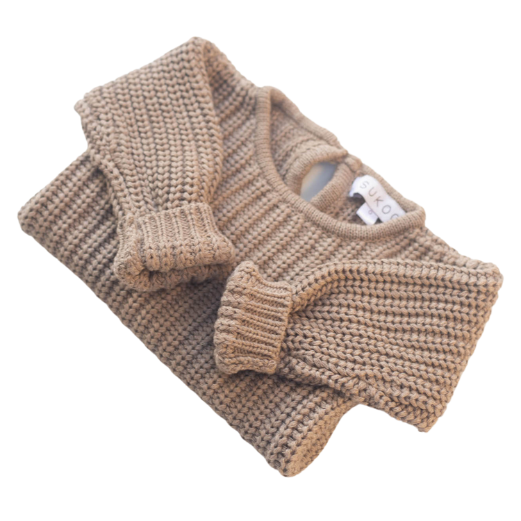 The Zoa knit is lovingly handmade using a loom which is a tool that is guided by the hand. 100% soft cotton, teardrop fastening at back with wood button. Good amount of stretch, considered true to size described as more ‘fitted’.