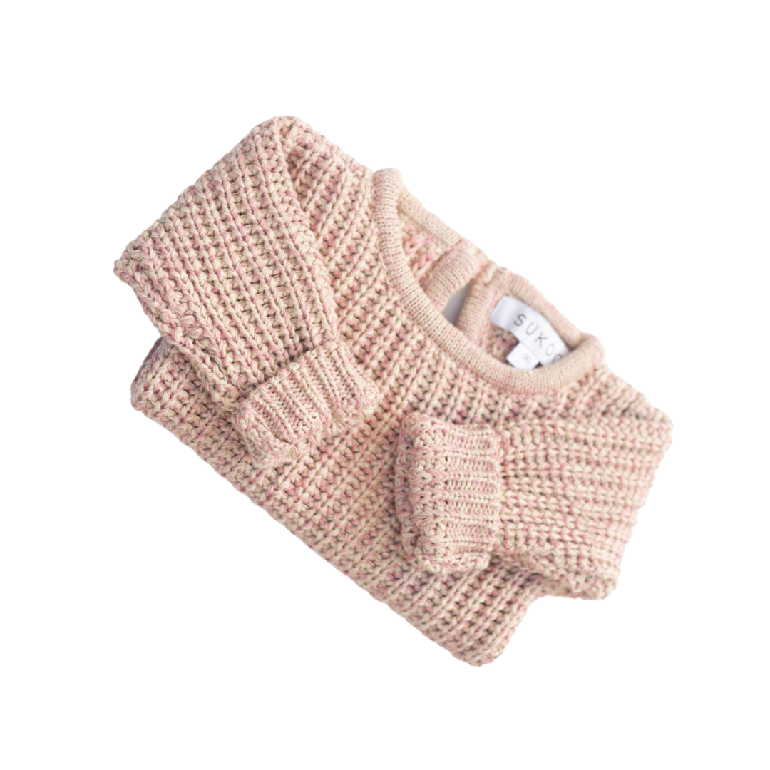The Zoa knit is lovingly handmade using a loom which is a tool that is guided by the hand. 100% soft cotton, teardrop fastening at back with wood button. Good amount of stretch, considered true to size described as more ‘fitted’.